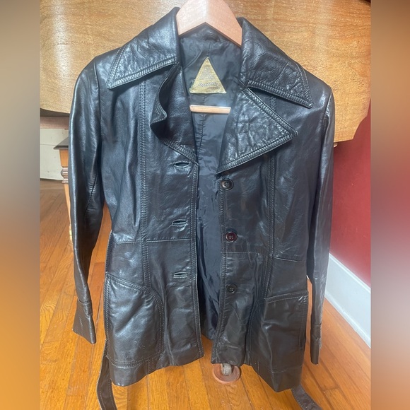 Vintage leather jacket with attached belt. In great shape. - Picture 1 of 3
